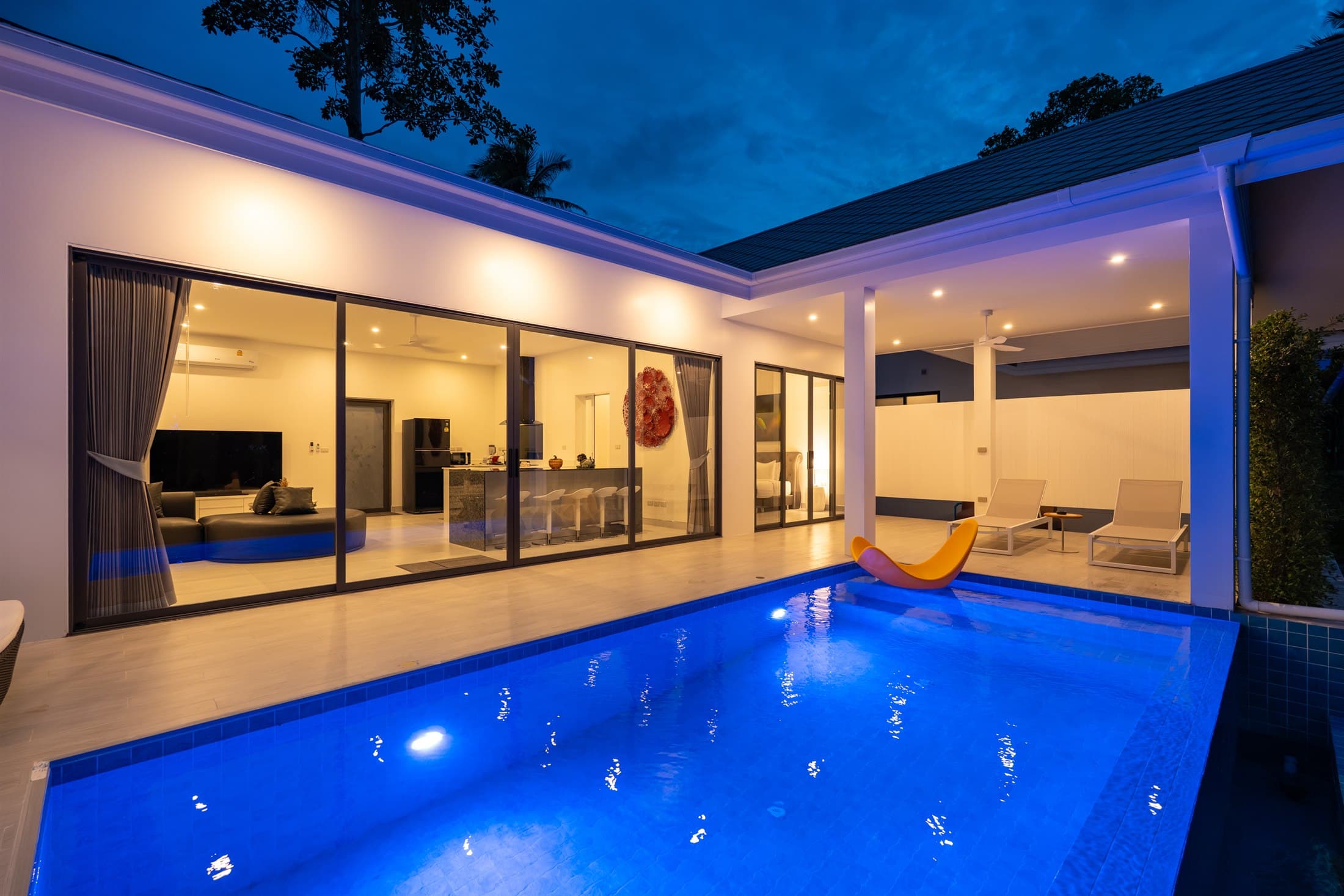 Villa and pool at dusk